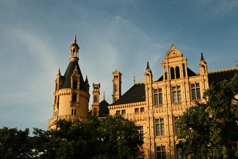 an image of a tall castle with towers