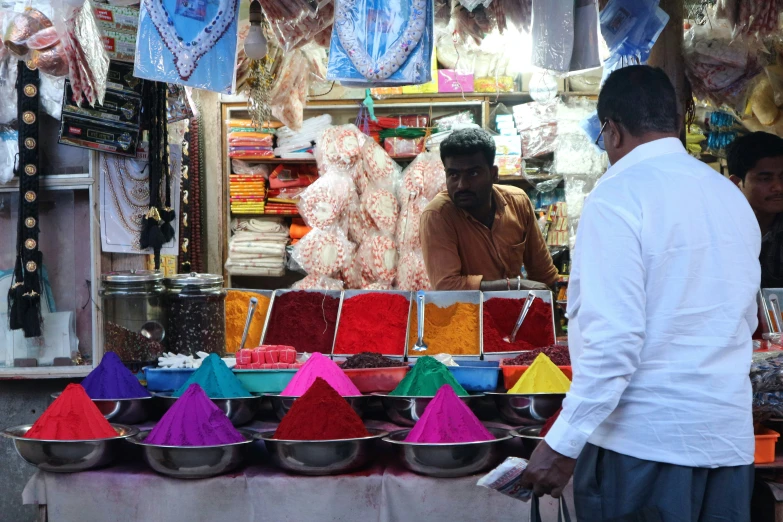 a shop with colorful indian goods for sale