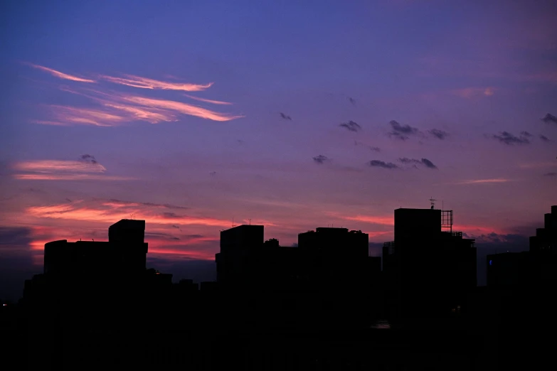 a sky line with the skyline in silhouette