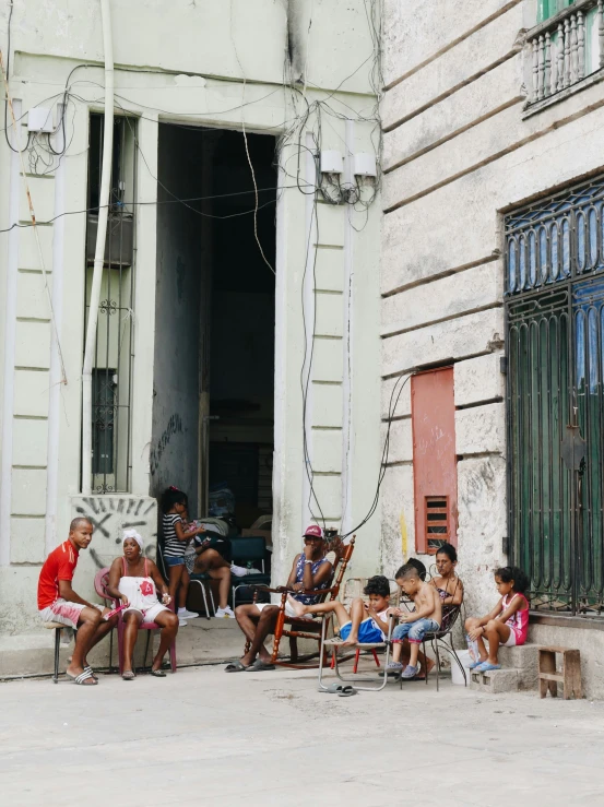 an image of people sitting on the steps