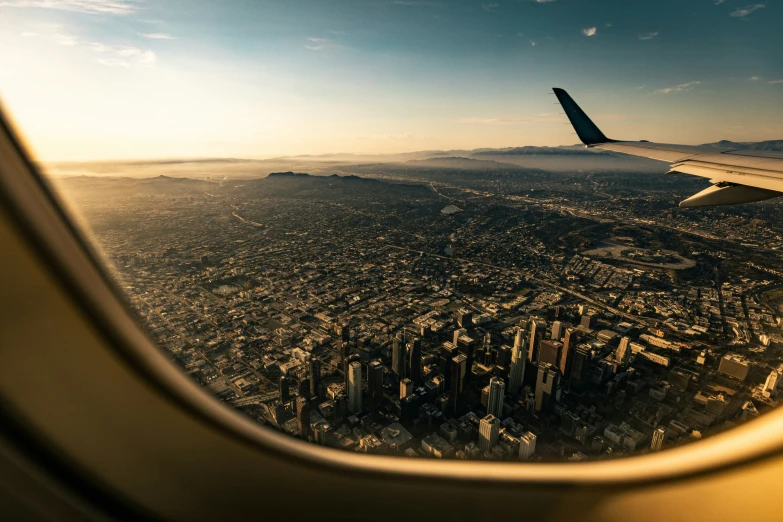 an airplane wing is seen through a window