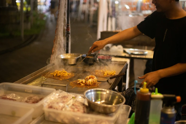 a person preparing food on a table