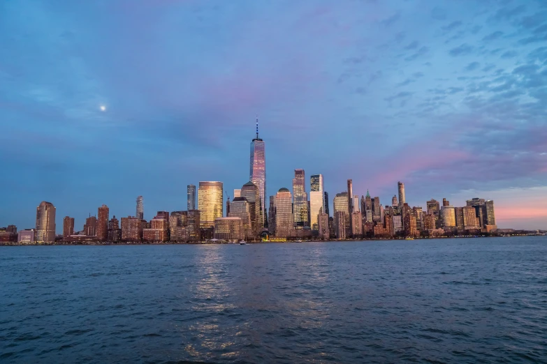 a city skyline in front of the water