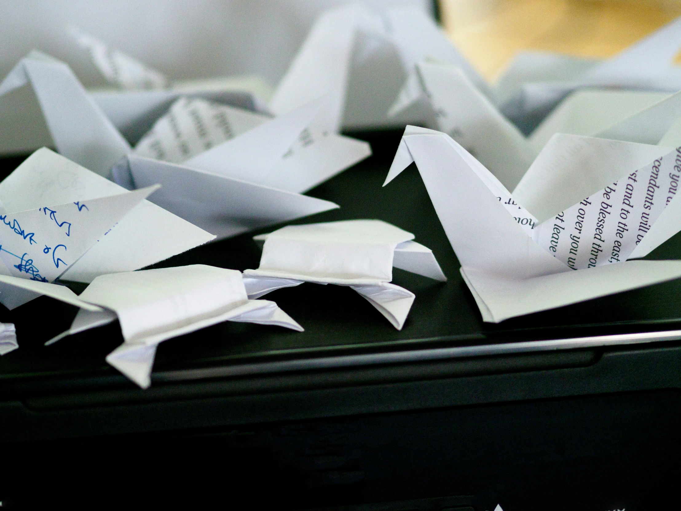 some pieces of paper are placed on a surface