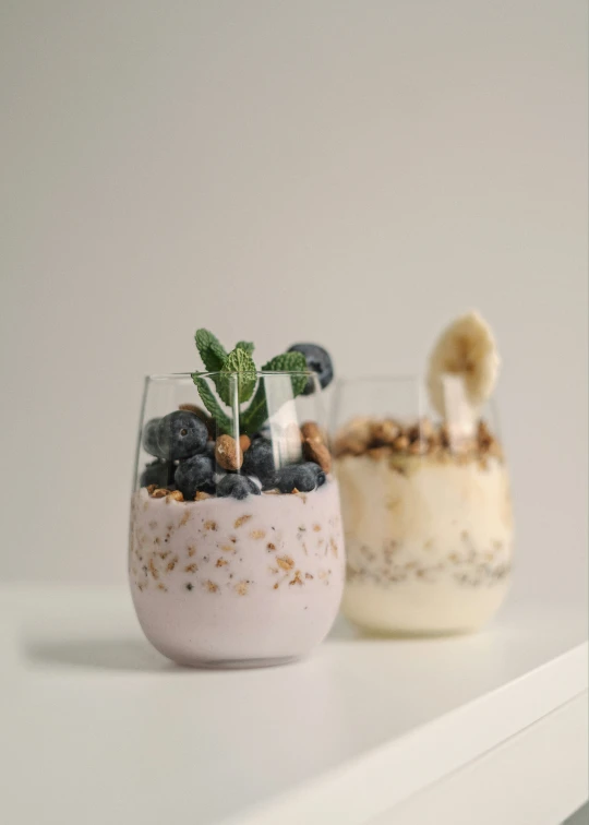 two dessert bowls with an exotic plant in the center