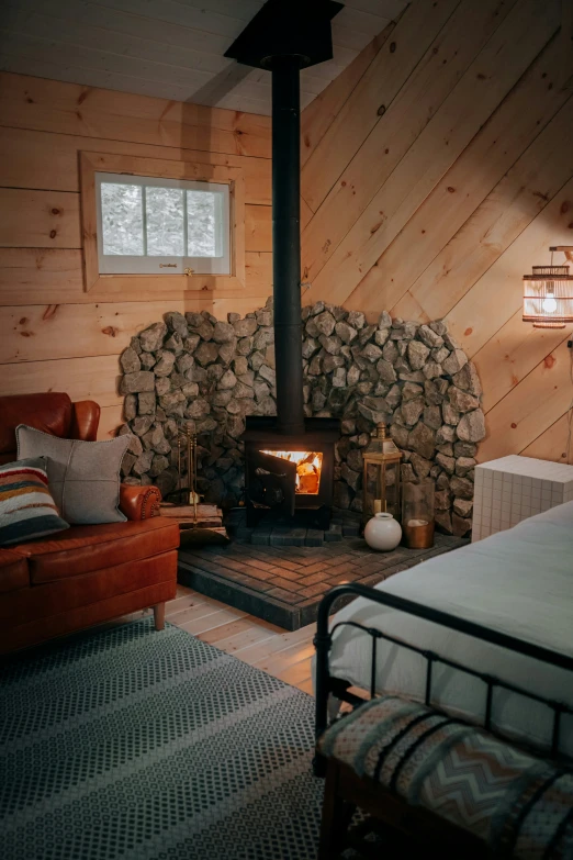 a living room filled with furniture next to a fireplace