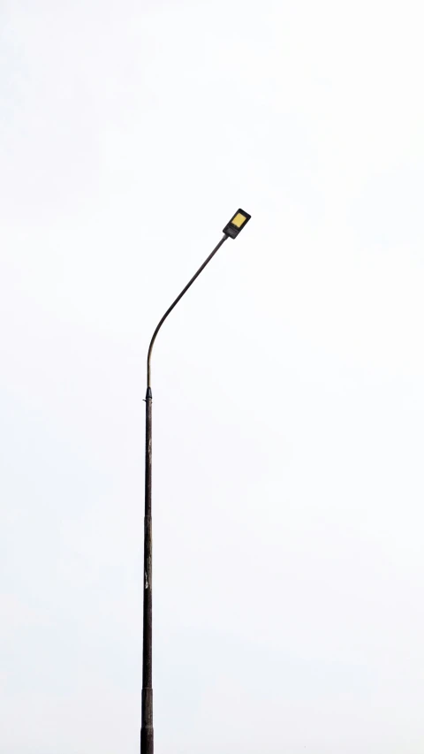 a very nice looking pole with a light