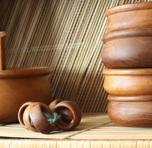 some brown wood pieces and an object on a shelf