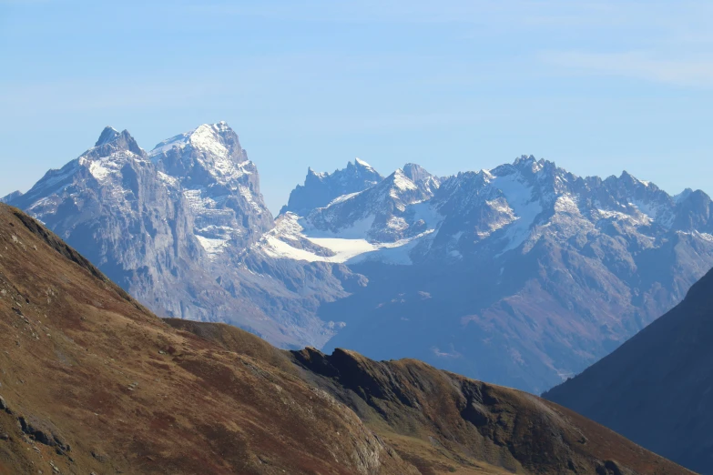 an image of the mountains with snow on them