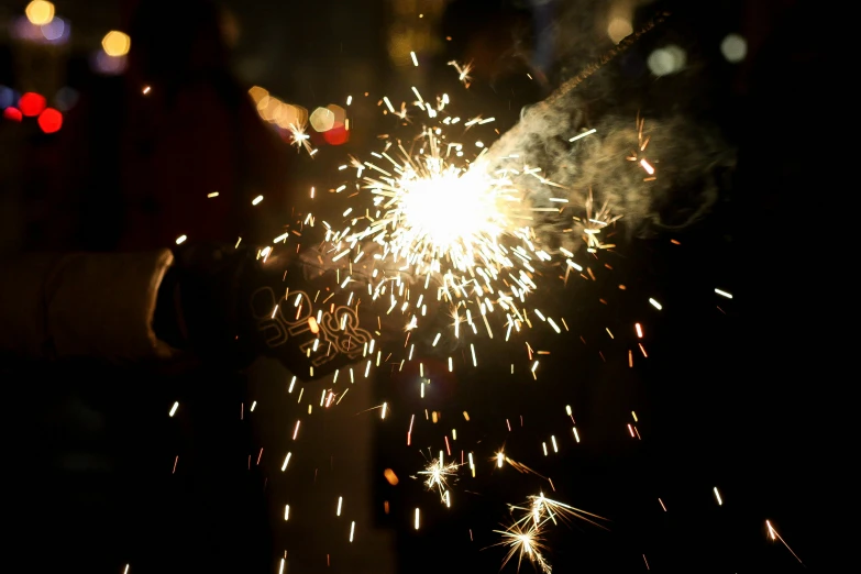 this is a black background with lights from firework