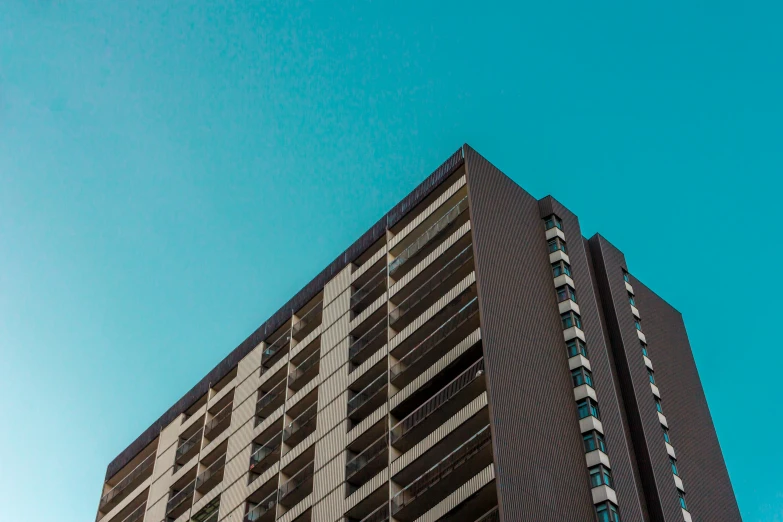 view of a tall building on top of the street