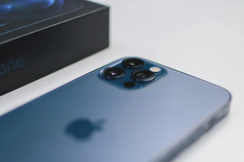 the back view of an iphone 11 pro on a table