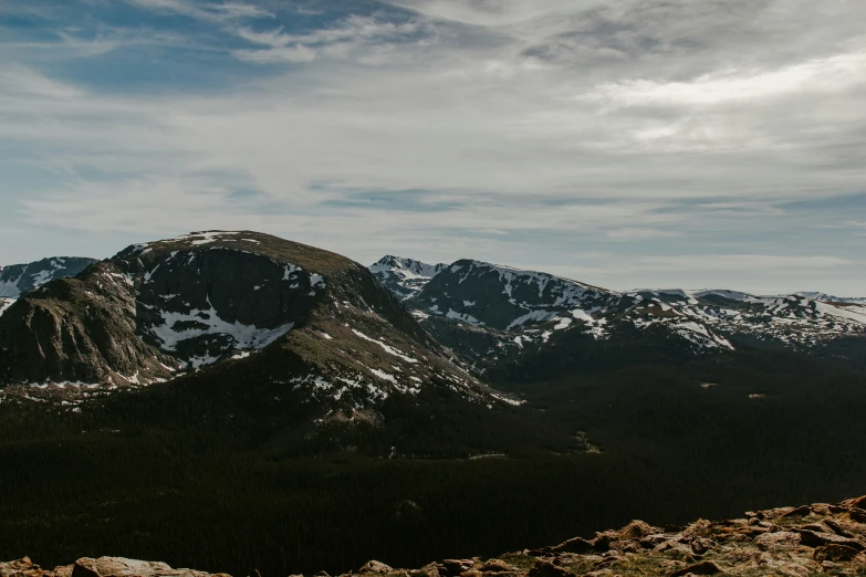 there is a mountain range with many snow covered mountains