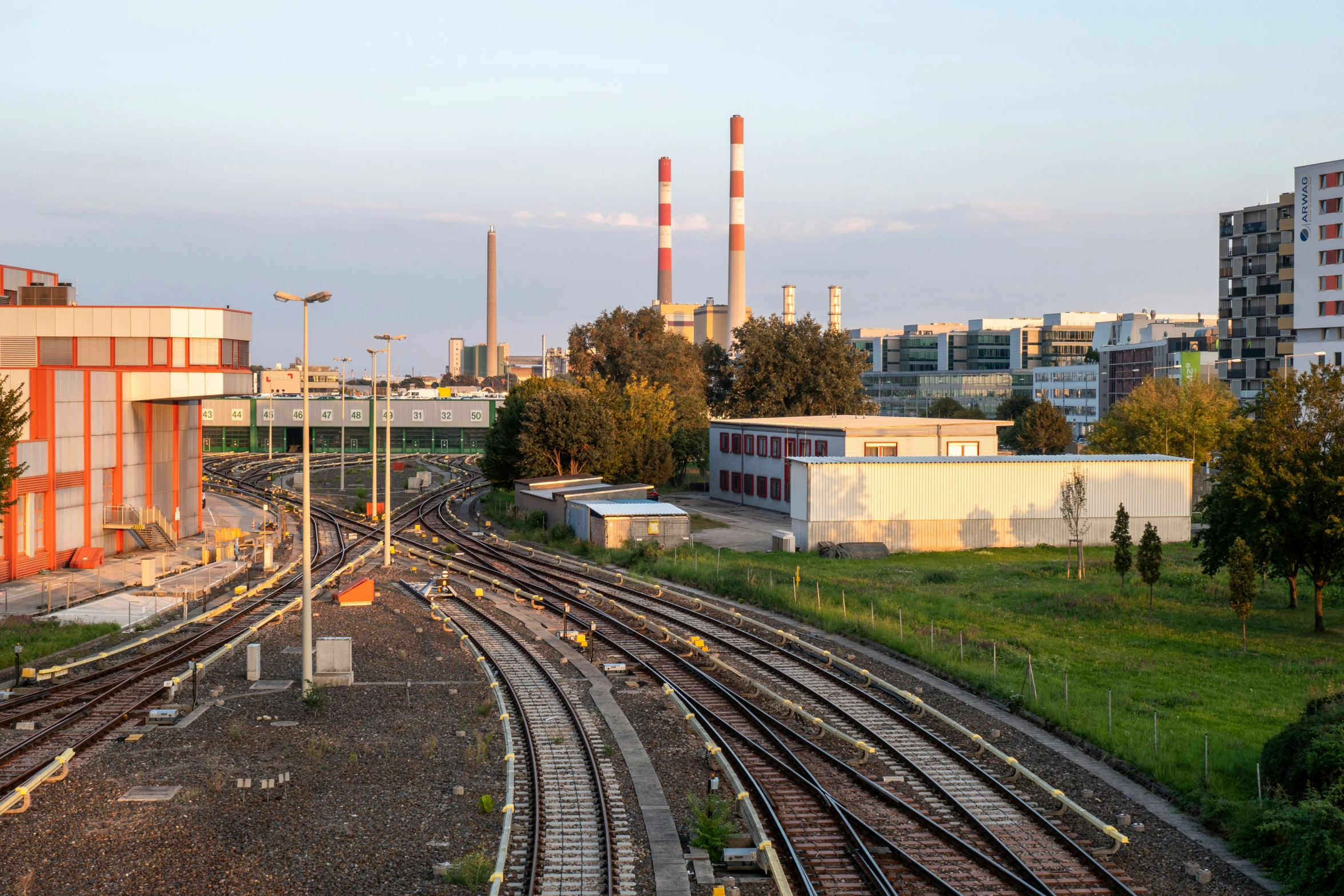 trains passing by in the distance in a city