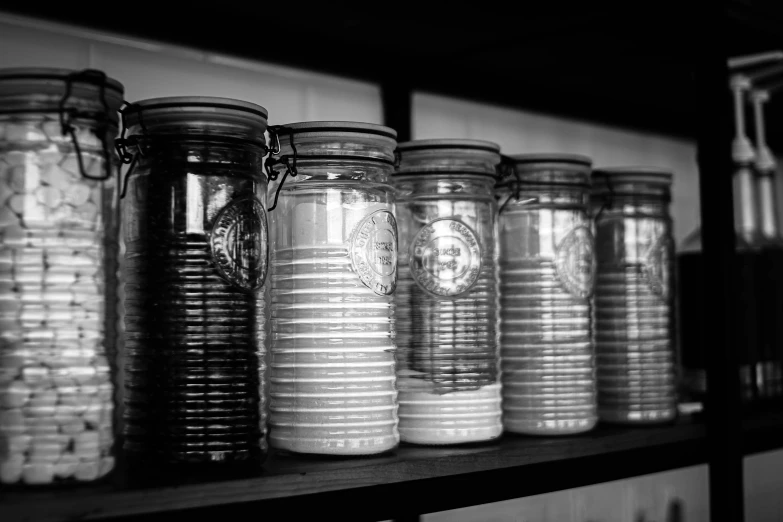 many jars sit on the shelves to hold things