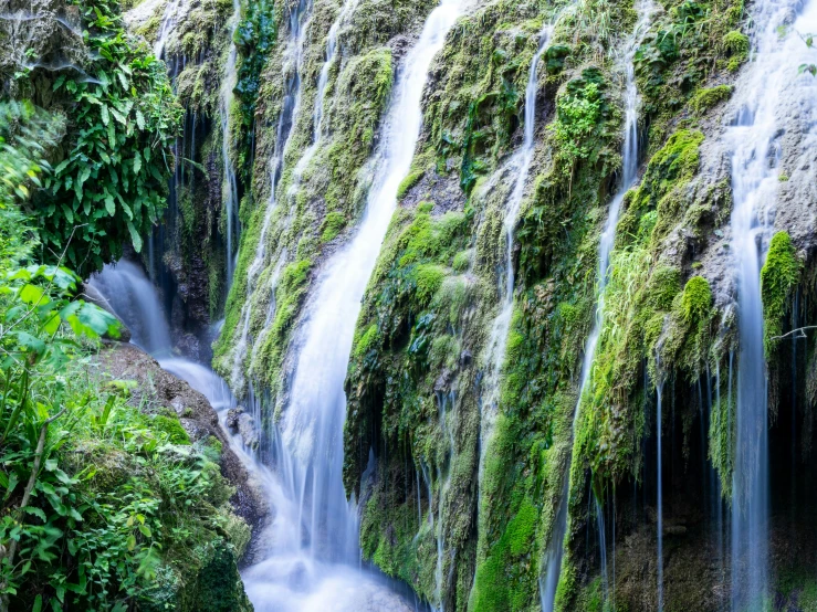 the view of a waterfall from inside