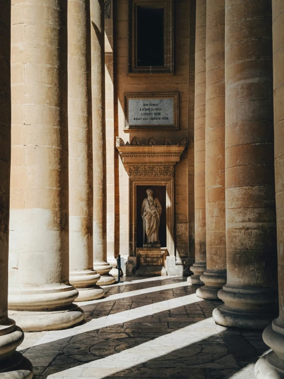 stone columns with a picture on top