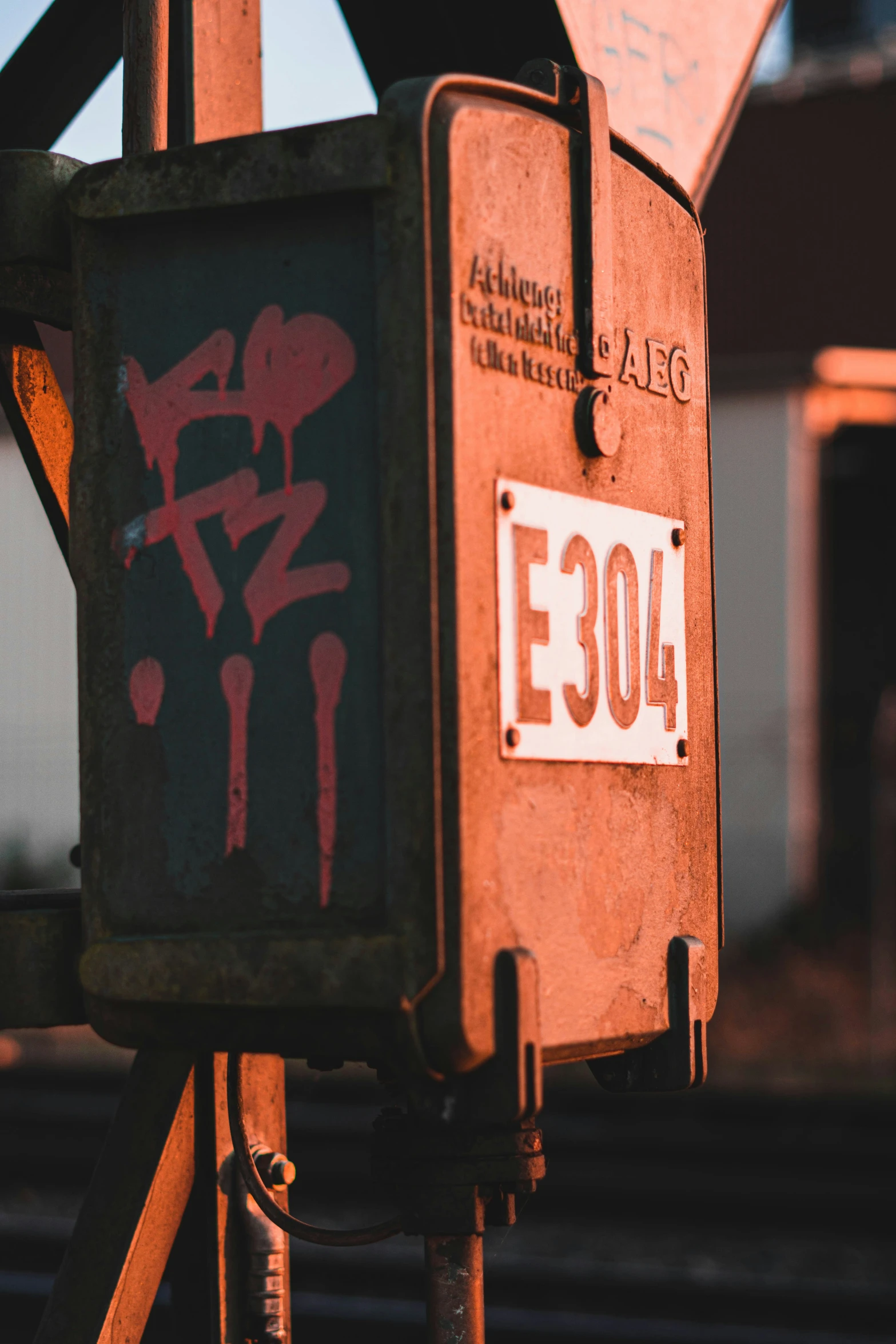 the red lights on a railway station are decorated with asian characters