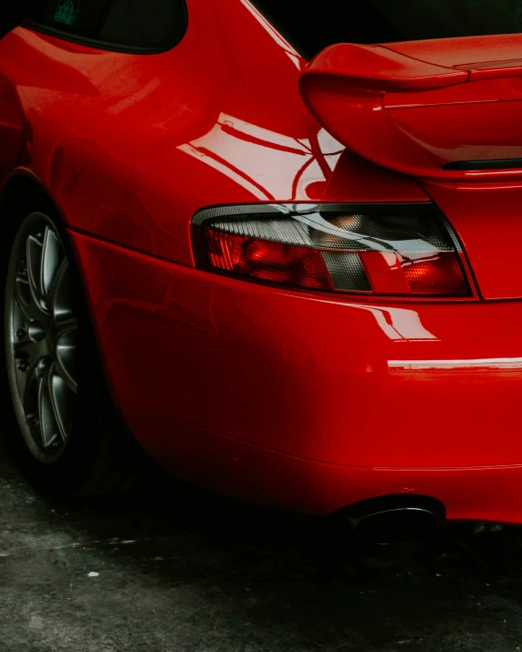 the back end of a red sports car