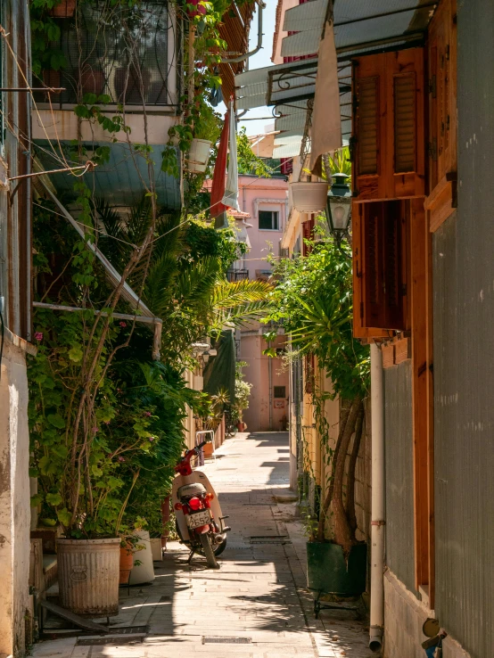 an alleyway lined with a number of buildings