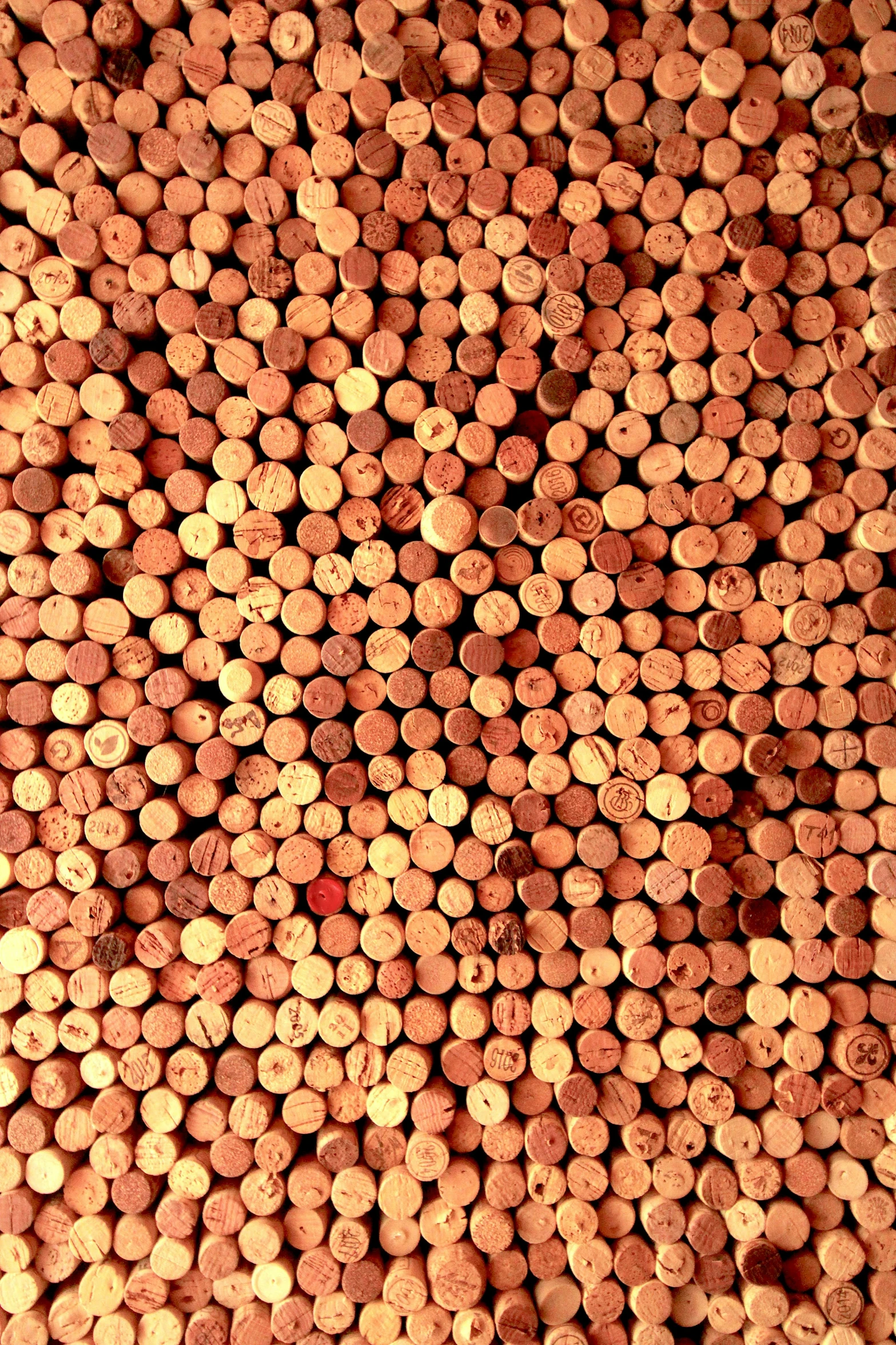 a number of different color pieces of wine cork