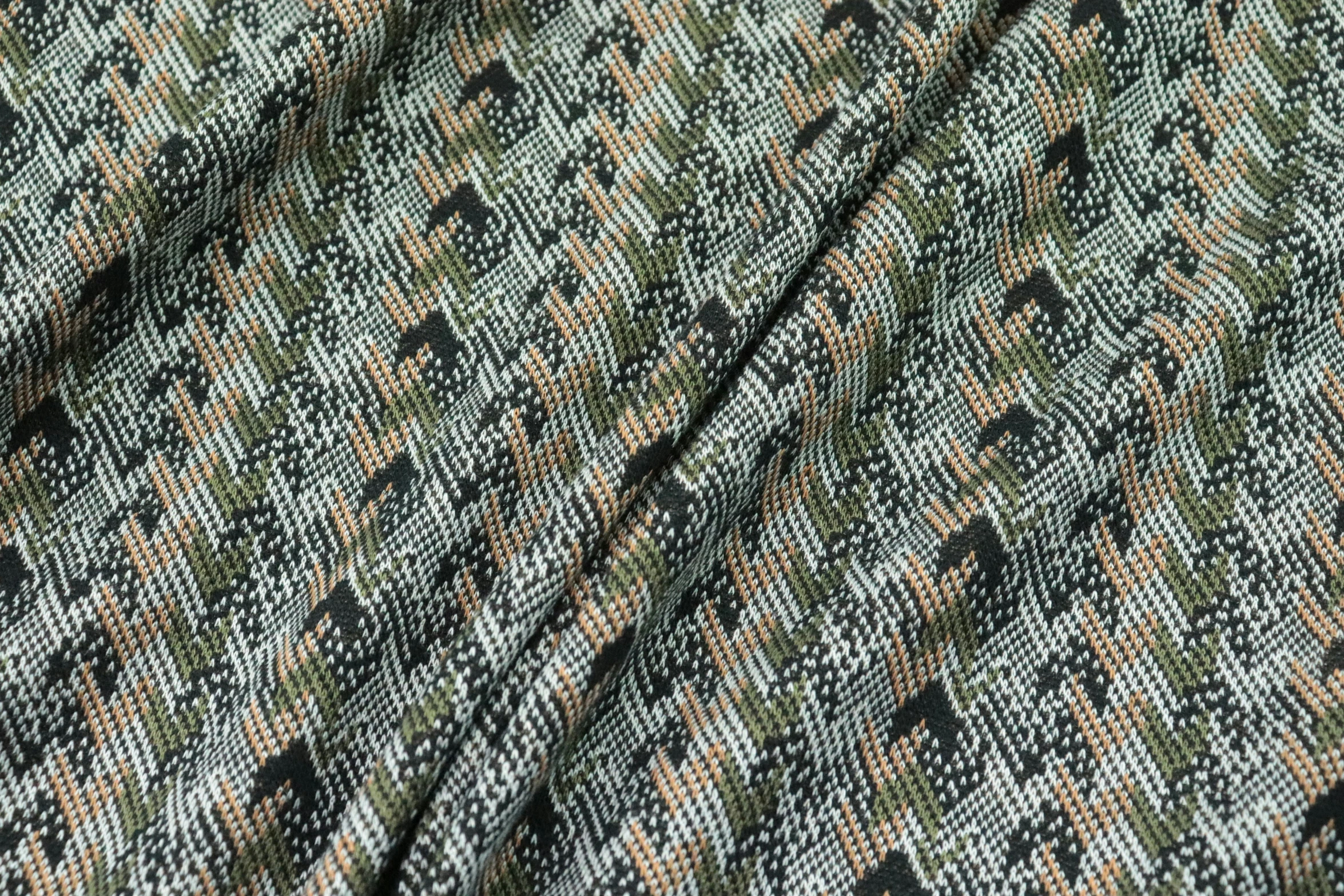 an animal - patterned pattern is shown on the fabric