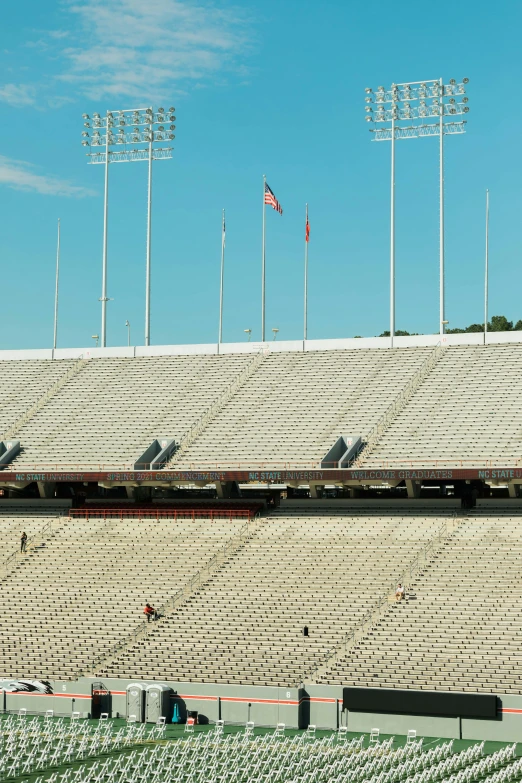 the stands at a baseball stadium are empty