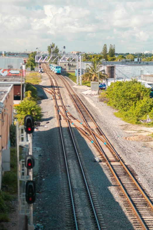 a view looking down at some train tracks