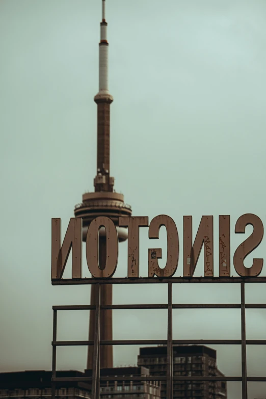 the large sign is positioned on top of the building