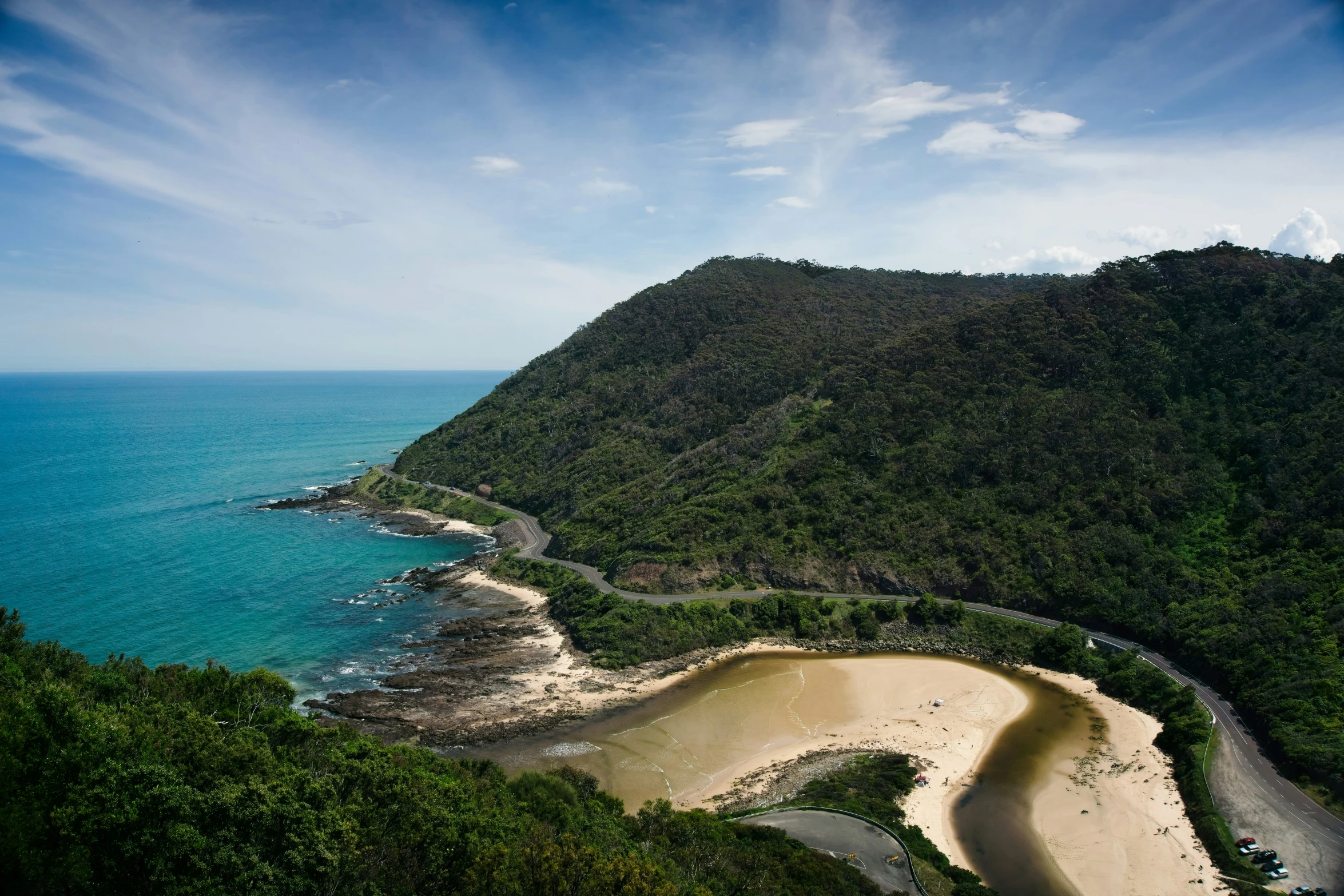 the beautiful coast and sand is next to the sea