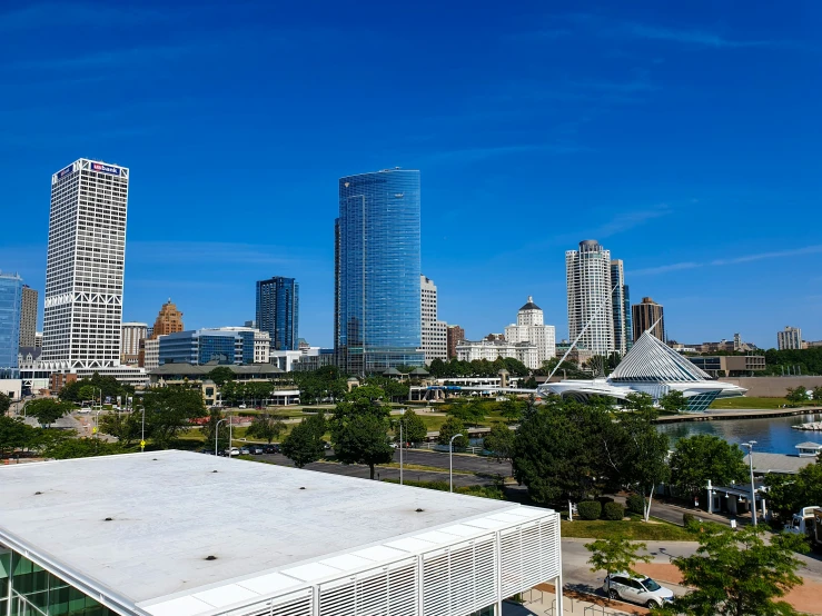 an aerial view of some tall buildings and trees