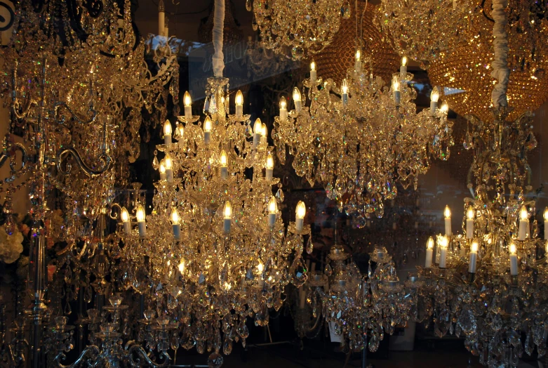 a close up of a chandelier with a large amount of lights on display