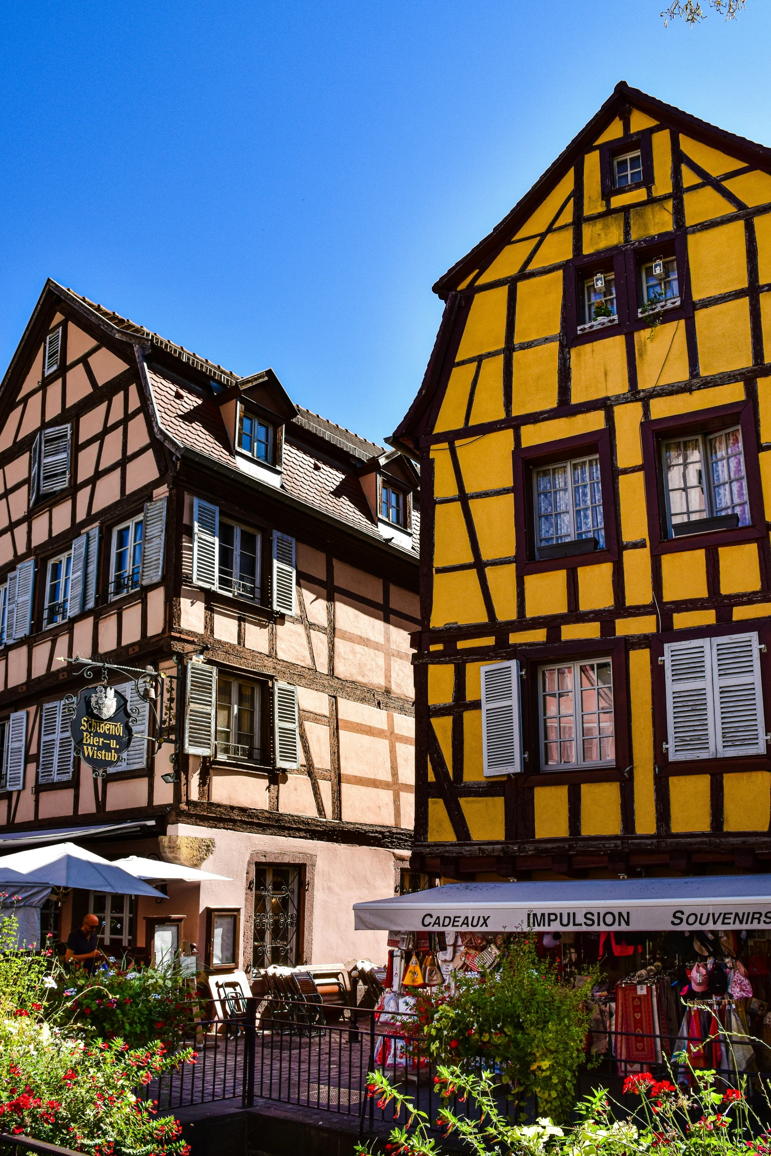 a building in a european city with lots of windows