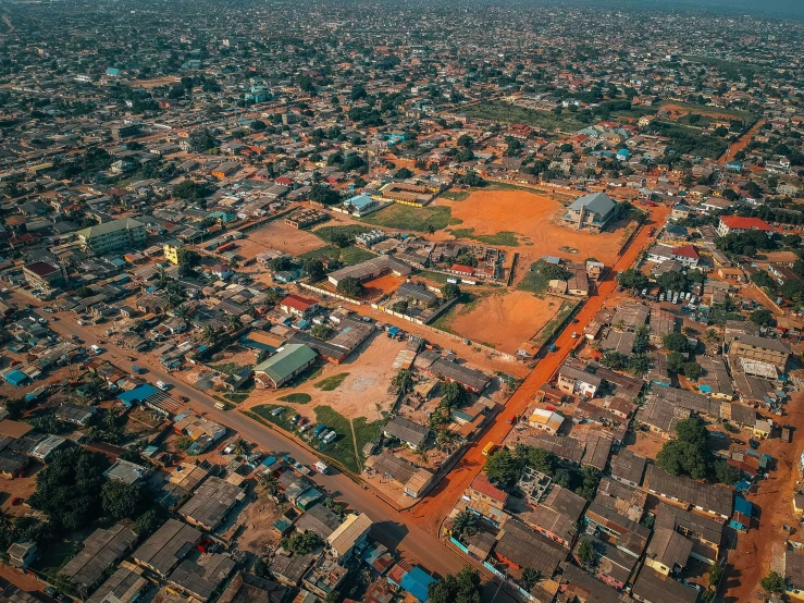 an aerial view of some very small houses and town