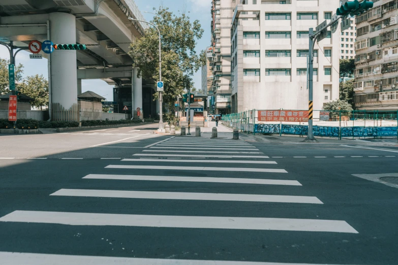 the intersection has several lanes and no traffic is shown