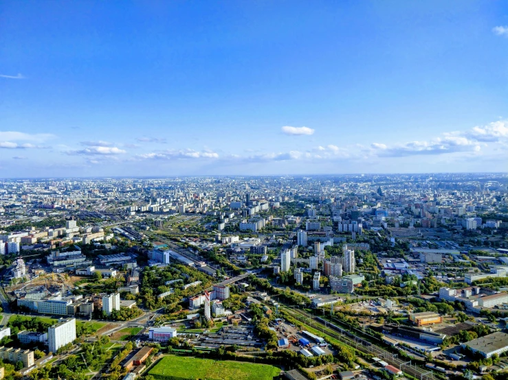 aerial view of a city with a park and many tall buildings