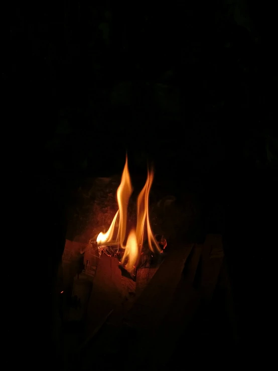 a very bright fire burning in the dark
