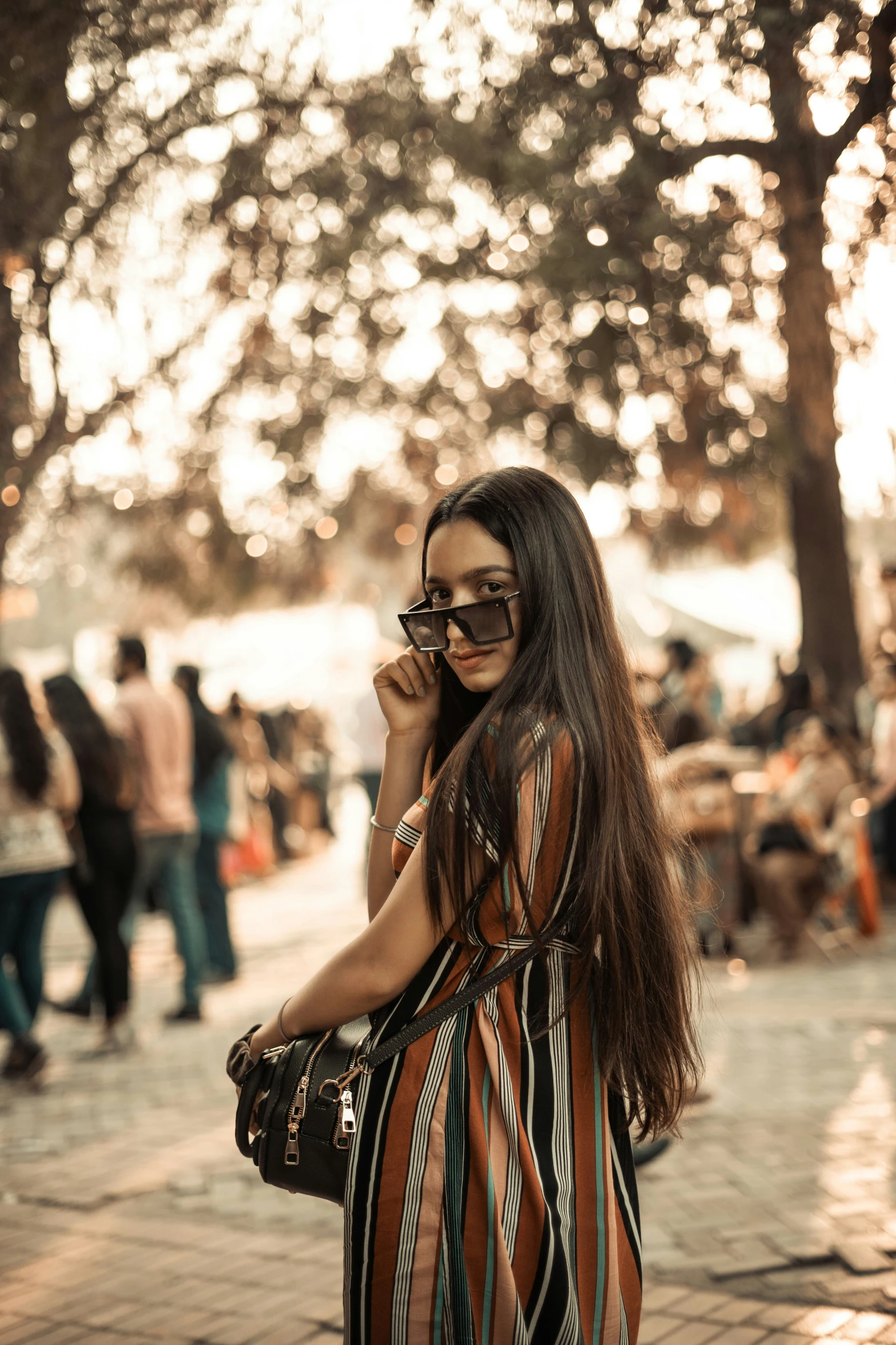 a woman in a dress on the phone