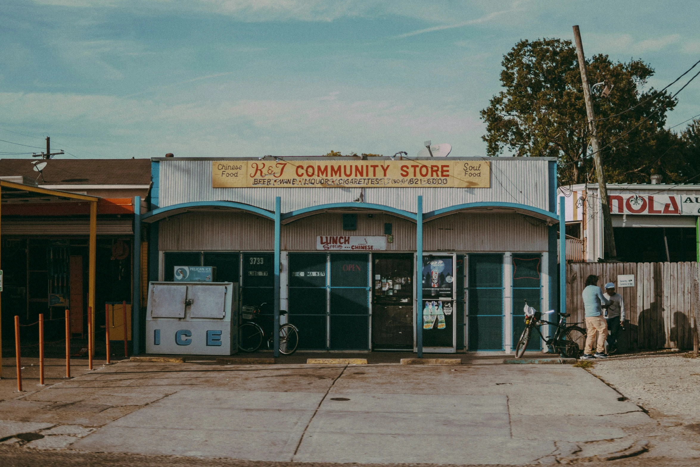 people are walking in front of a store