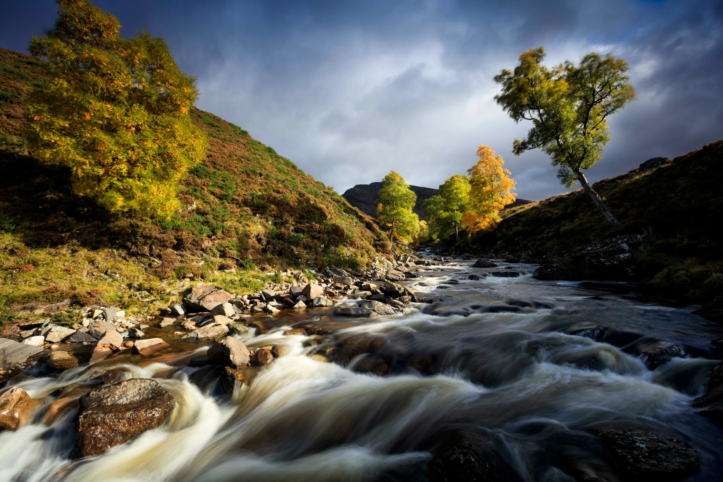 there is water that has been rushing along the rocks