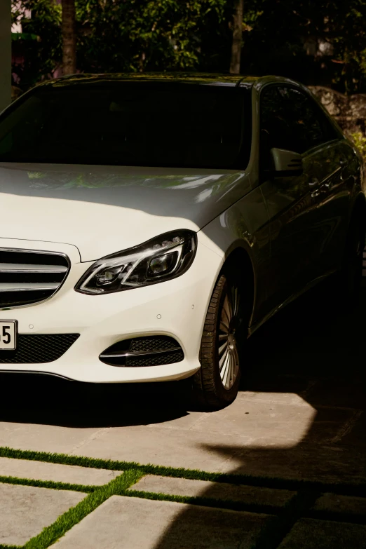 a mercedes benz s 350 sitting in the driveway