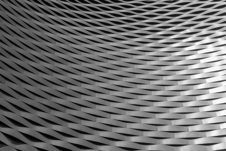 an abstract black and white po of a curved metal structure