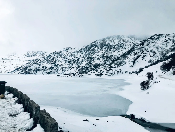 a scenic po of a snowy mountain range