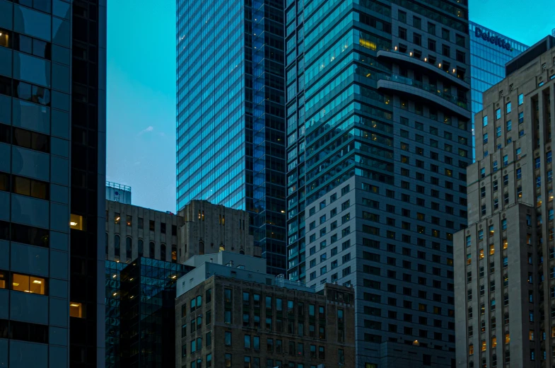 view of city buildings in the evening sky