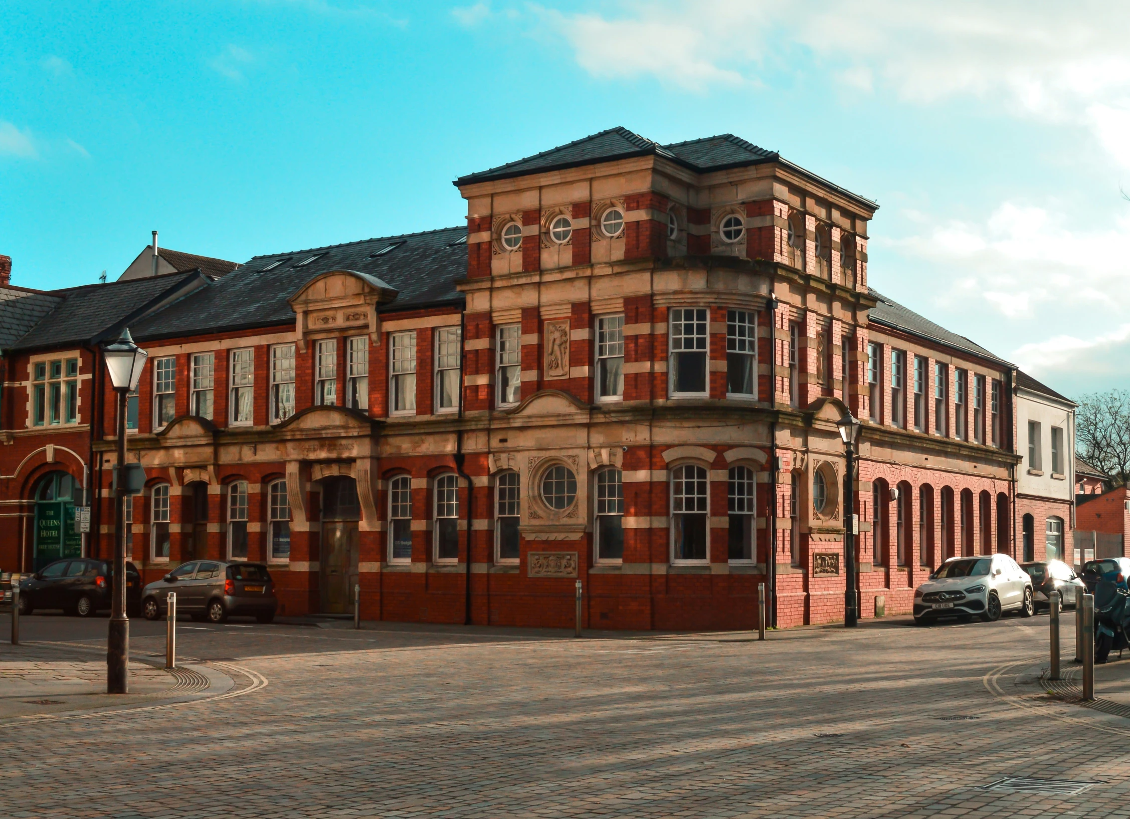 a very large building in the middle of an open area