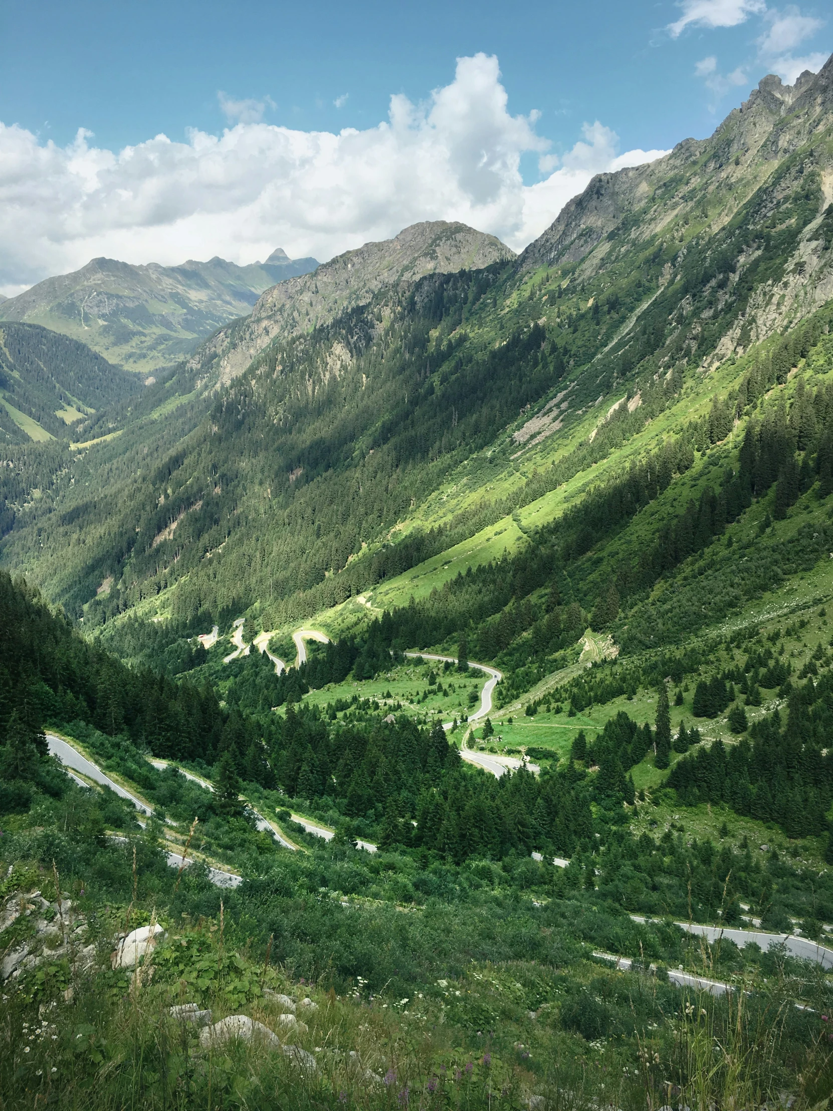 a mountain valley, with roads in the mountains