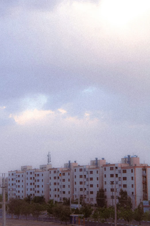 some building on the edge of an empty beach