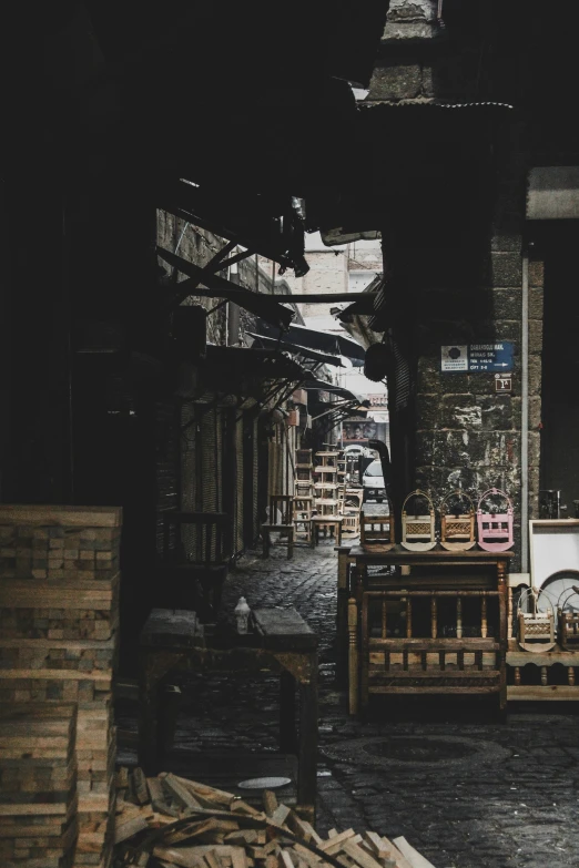 a city street with lots of furniture and a bike