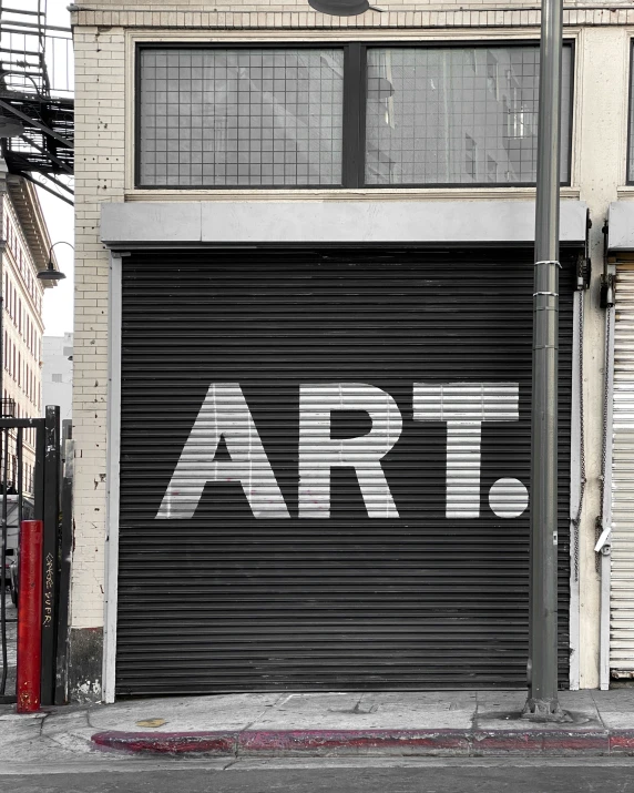 a garage with the word art painted on it