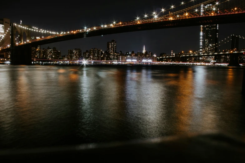 a picture of a large bridge at night